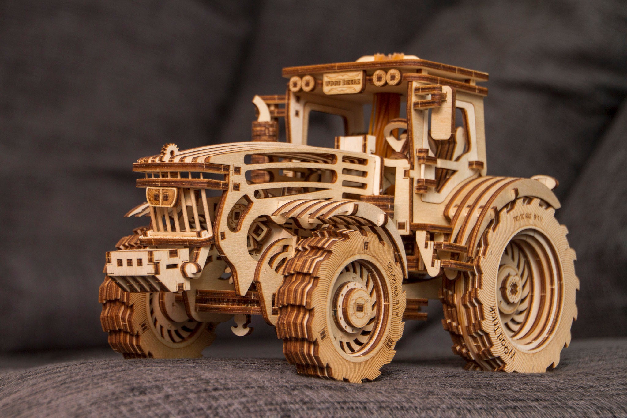 Tractor can't disappoint you. Awesome 3d wooden mechanical model.